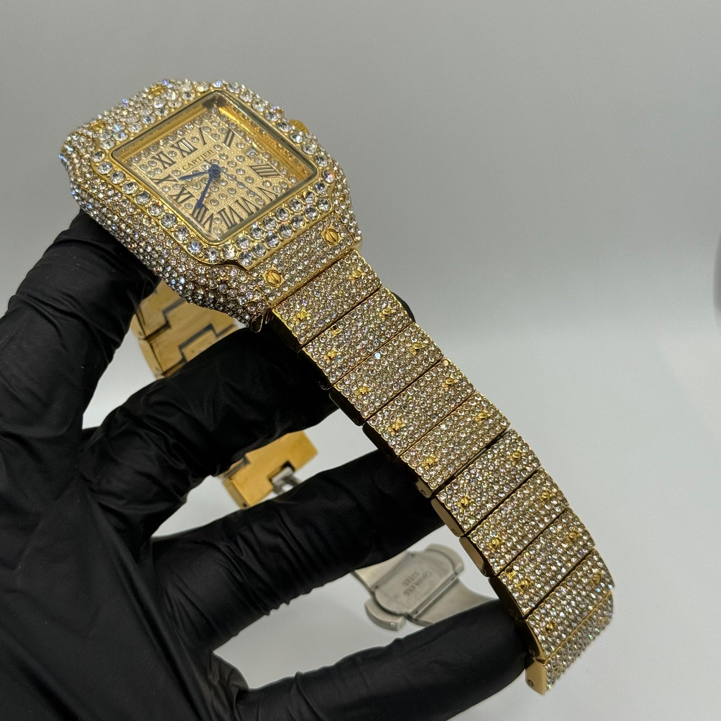 CARTIER karan Aujla watch golden color
